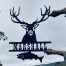 Custom made metal wall art house name sign incorporating red deer stag and fish